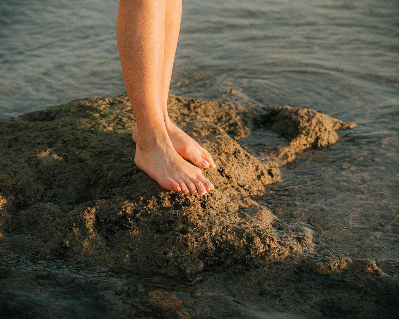 barefoot, human feet, sea, ocean, seashore, beach, summer vibes, nature, outdoors, rock, wellness, relaxation, vacation, mindfulness, balance, freedom, harmony, natural textures, slow living, golden hour, sunlight, lifestyle, travel, tranquility, peaceful