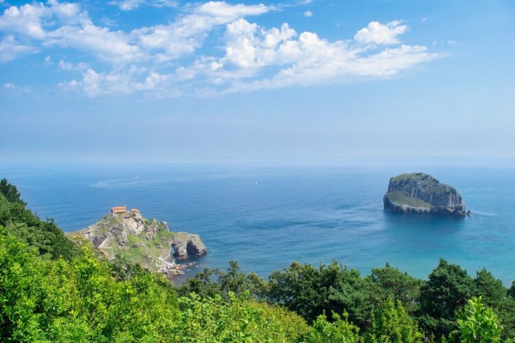 coast, sea, island, july day, church, calm, panorama, summer, clouds, cliff, nature, excursion, hiking, photography, spanish architecture, tourist attraction, blue sky, water surface, monument, green